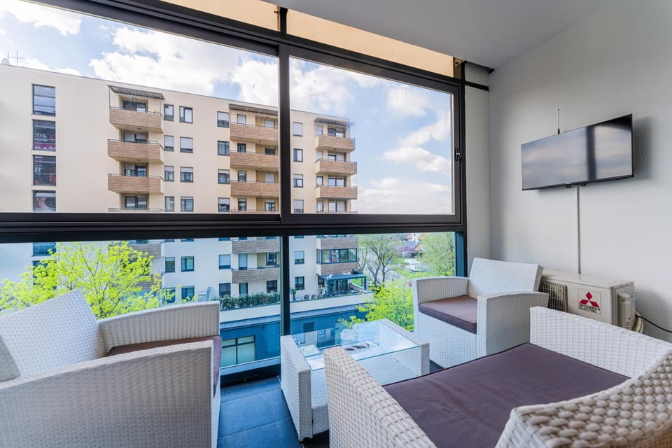 Property building, Day, TV and multimedia, View (from property/room), Living room, Seating area