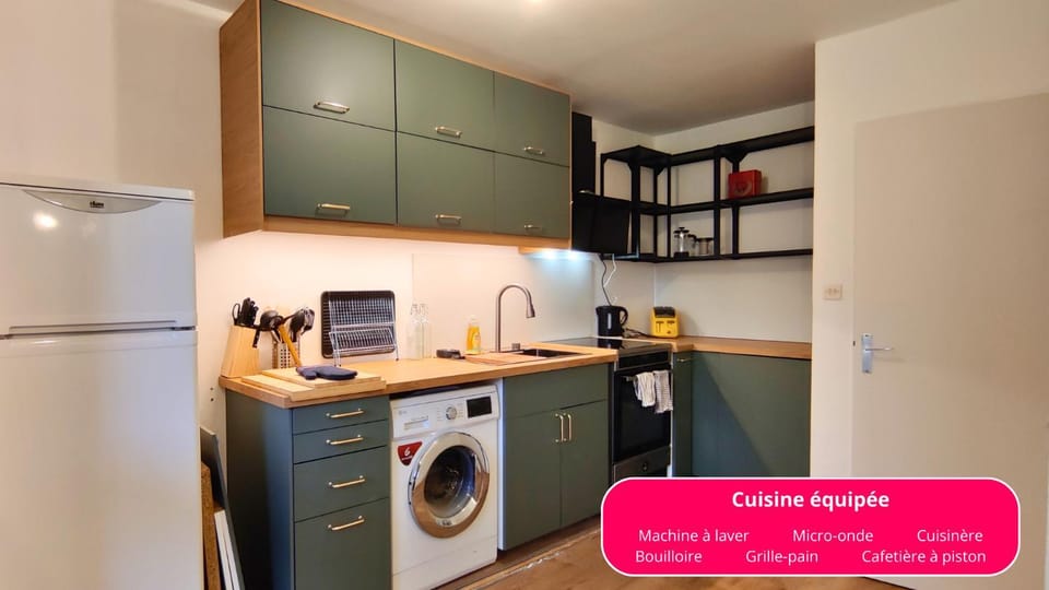 Kitchen or kitchenette, oven, stove, toaster, washing machine