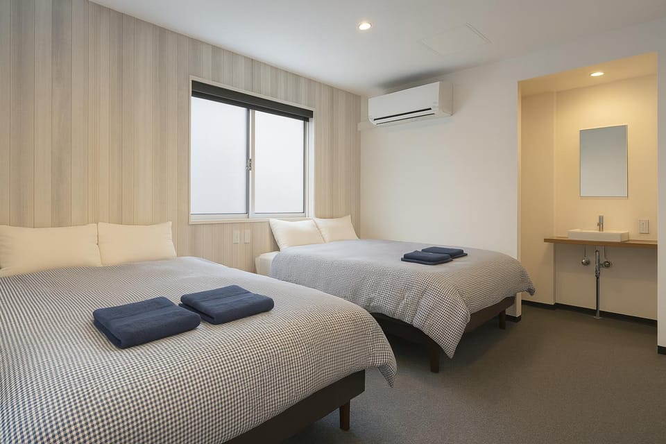 Bed, Photo of the whole room, Bedroom, towels, air conditioner