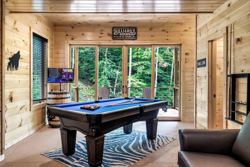 Enchanting Cabin with Game Room, Indoor Pool and Porch in Tennessee Cabin in Sevierville