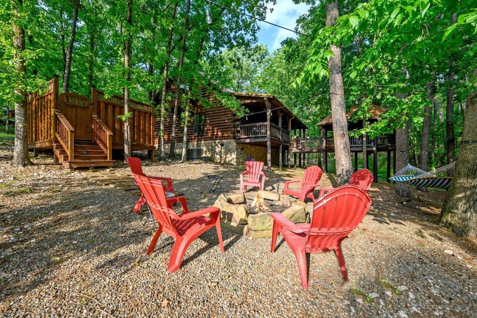 Gorgeous Spacious Log Cabin with Hot Tub Surrounded by Trees and Close to Broken Bow Lake in Hochatown, Oklahoma Cabin in Oklahoma