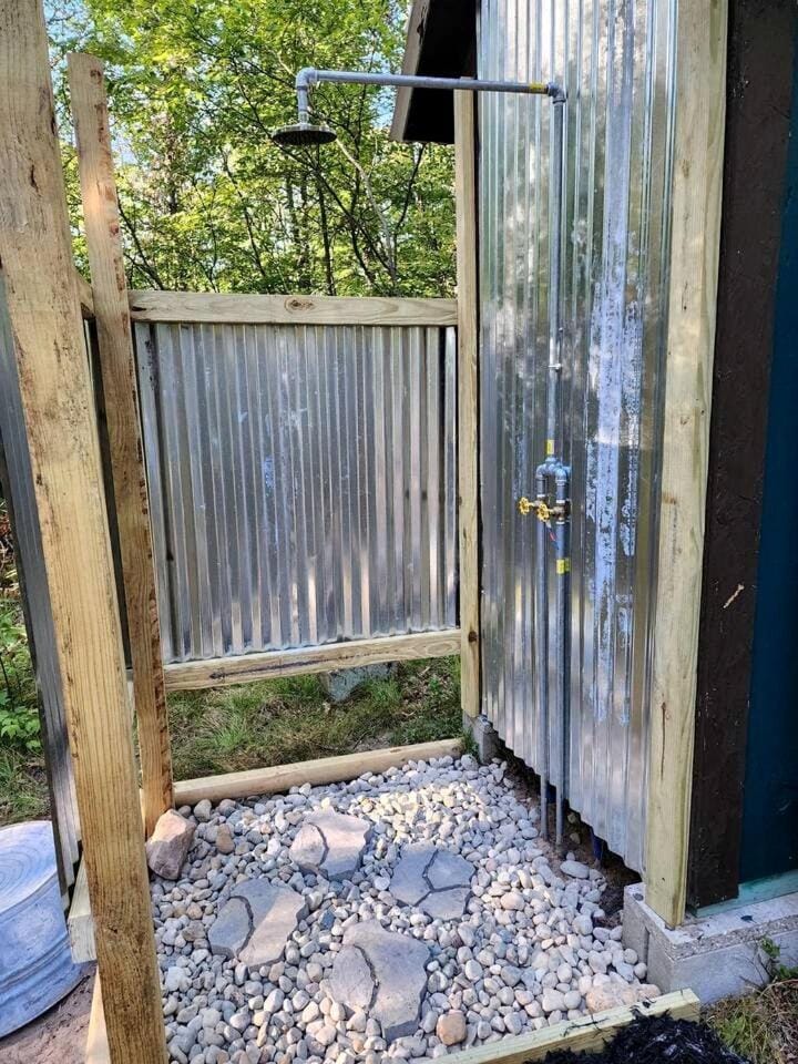 Rustic Converted School Bus with Outdoor Shower Near ORV Trails in Manistee National Forest, Michigan House in Michigan