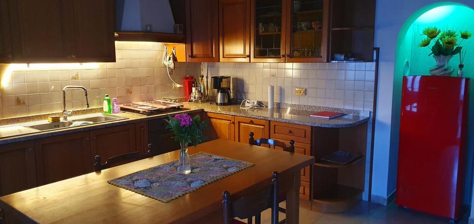 Kitchen or kitchenette, dishwasher, oven, stove