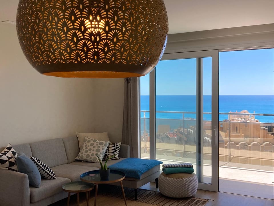 Natural landscape, Living room, Seating area, Sea view