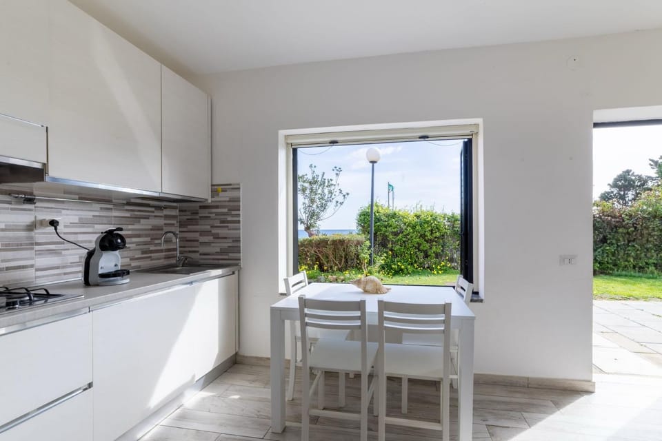 Patio, Kitchen or kitchenette, Dining area, Garden view, Sea view, Sea view