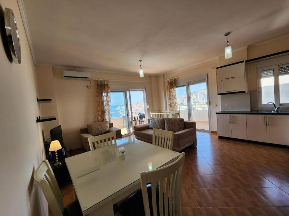 Kitchen or kitchenette, Living room, Dining area, oven, stove, air conditioner