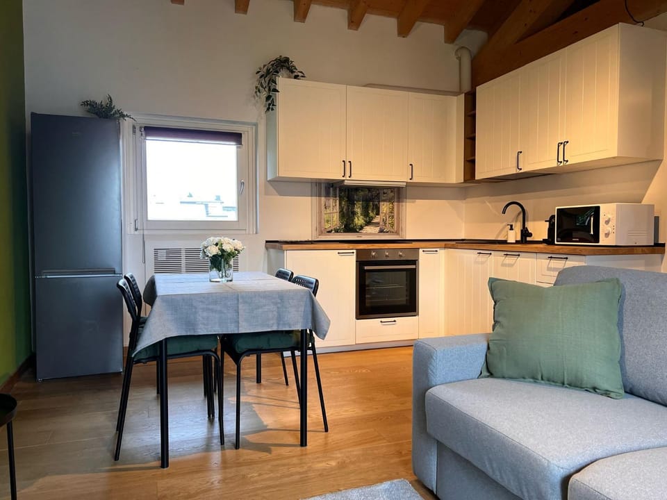 Kitchen or kitchenette, Living room, Seating area, Dining area, stove