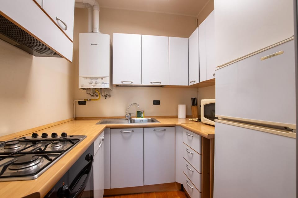 Kitchen or kitchenette, oven, stove