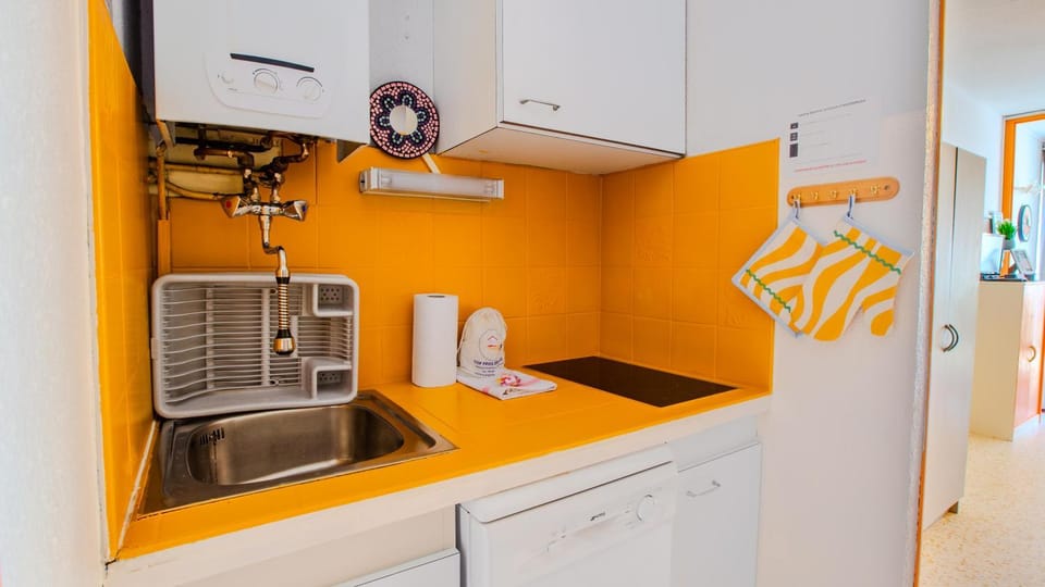 Kitchen or kitchenette, stove