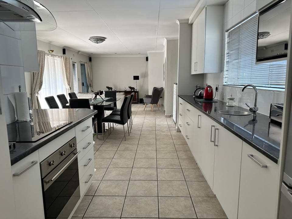TV and multimedia, Living room, Seating area, Dining area, dishwasher, oven, stove, toaster