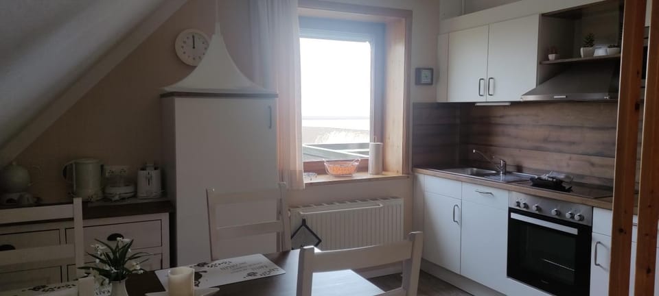 Ferienwohnung Osterkoog Sonnenuntergang Apartment in Nordstrand