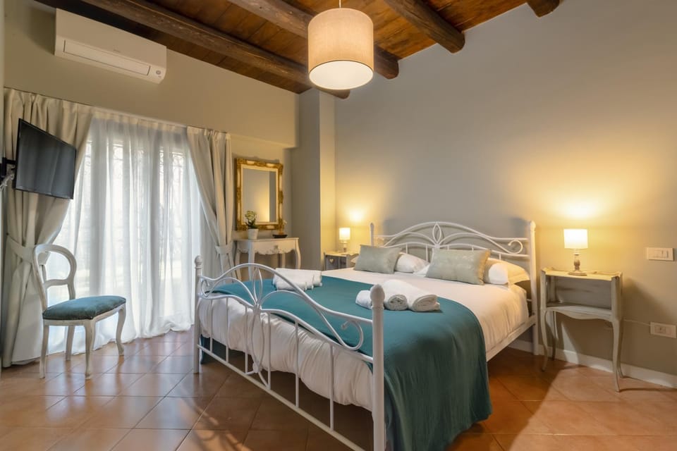 Bed, Photo of the whole room, Bedroom, towels, air conditioner