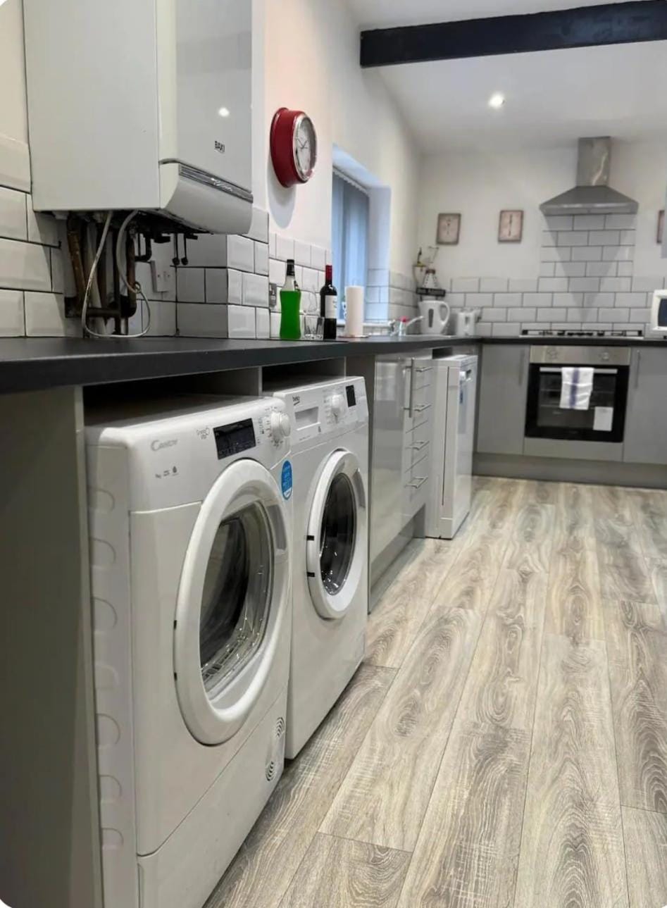 Kitchen or kitchenette, dishwasher, oven, pet friendly, stove, toaster, washing machine, dryer