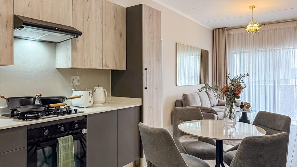 Kitchen or kitchenette, Living room, Dining area, stove, toaster