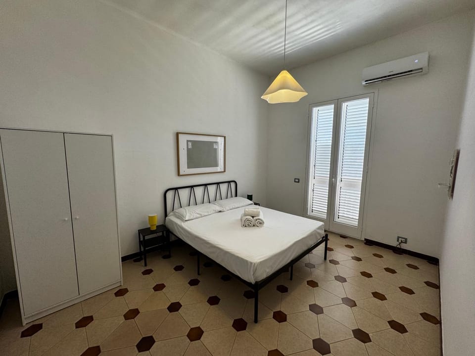 Bed, Photo of the whole room, Bedroom, towels, air conditioner