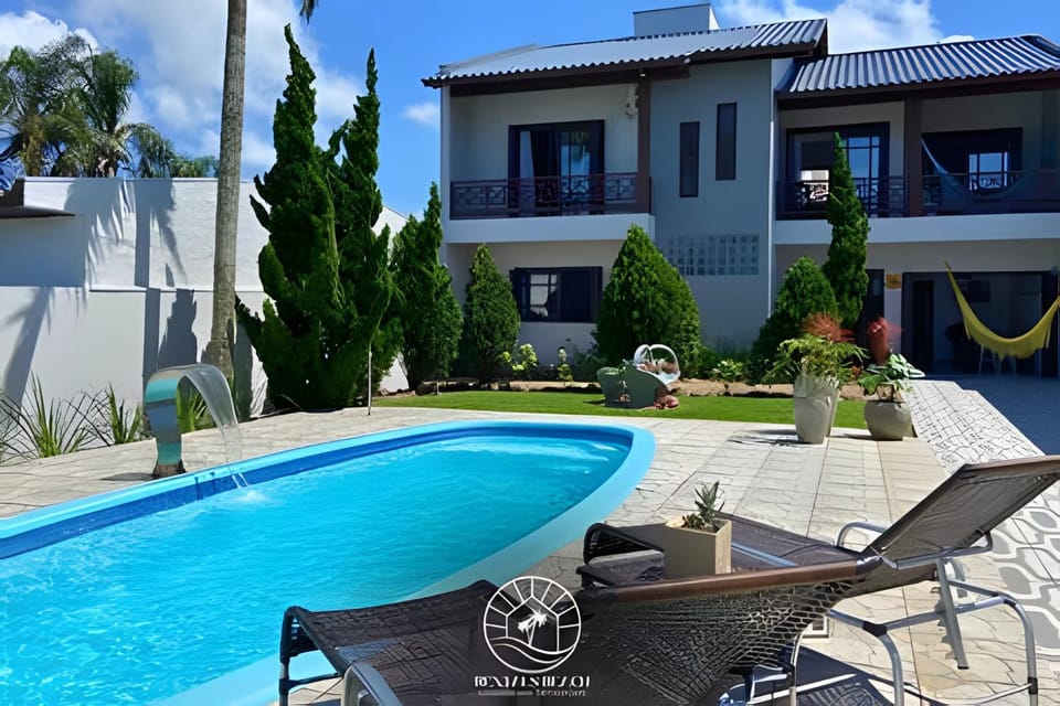 Facade/entrance, Day, Garden, Pool view, Swimming pool, sunbed