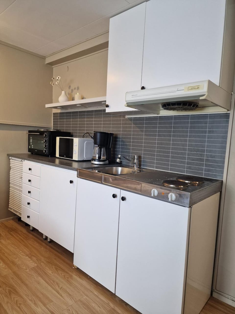 Kitchen or kitchenette, stove