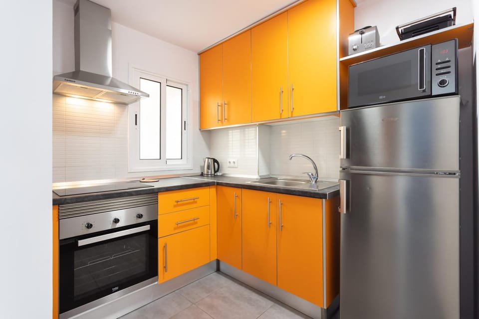Kitchen or kitchenette, oven, stove, toaster