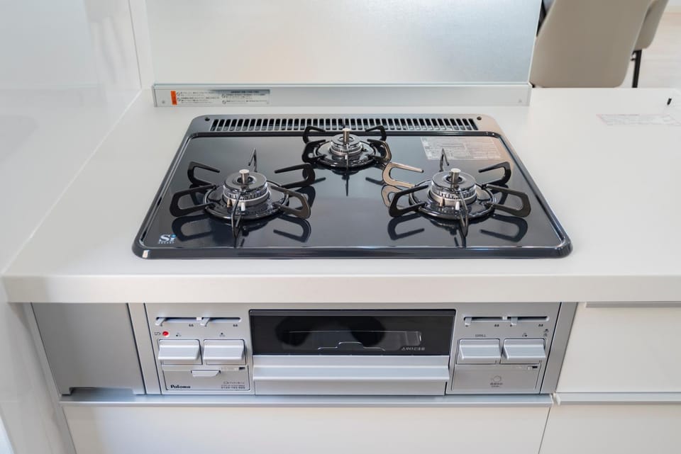 Kitchen or kitchenette, stove