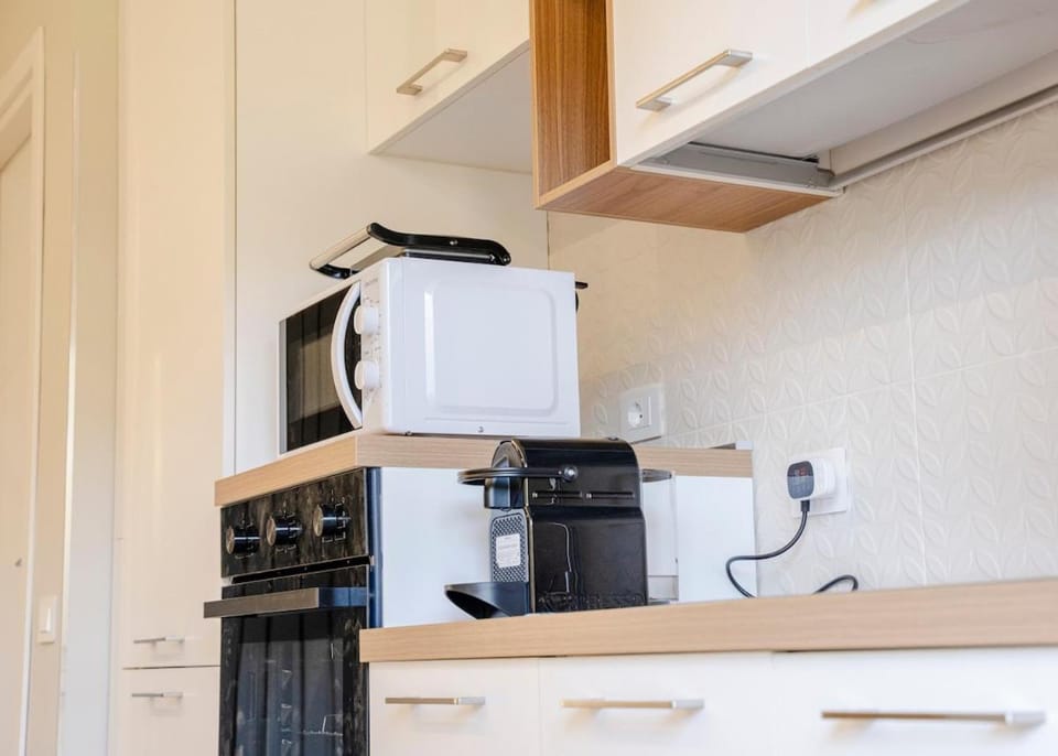 Kitchen or kitchenette, oven, stove, toaster