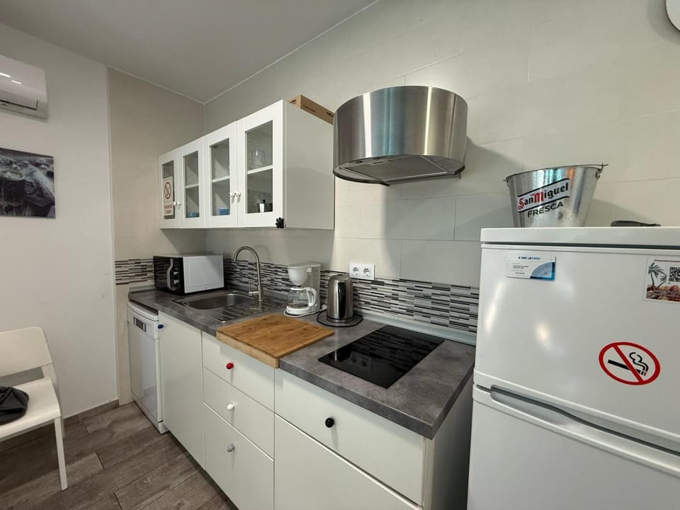 Kitchen or kitchenette, stove, toaster
