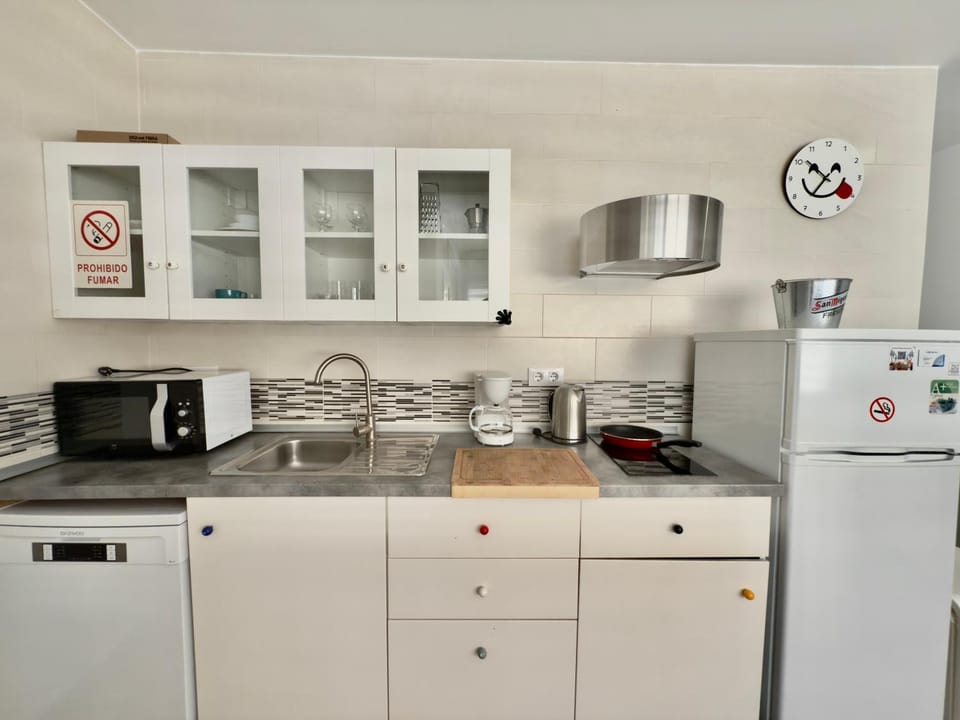 Kitchen or kitchenette, stove, toaster