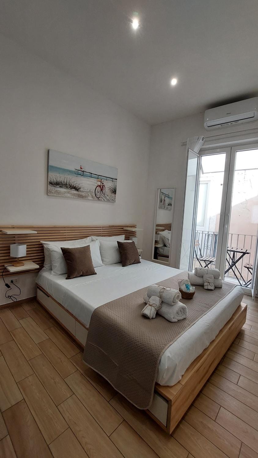 Bed, Photo of the whole room, Bedroom, towels, air conditioner