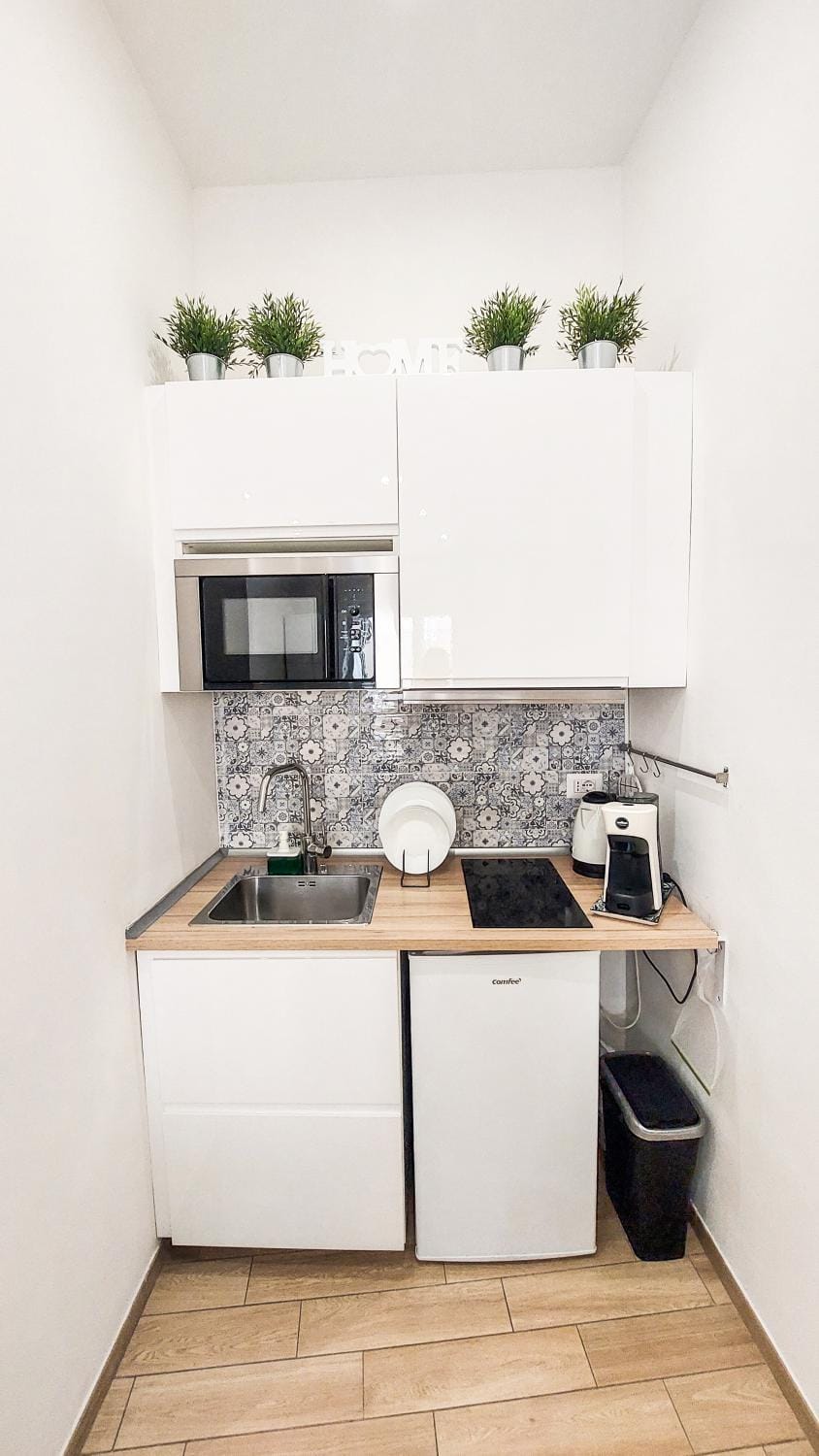 Kitchen or kitchenette, stove