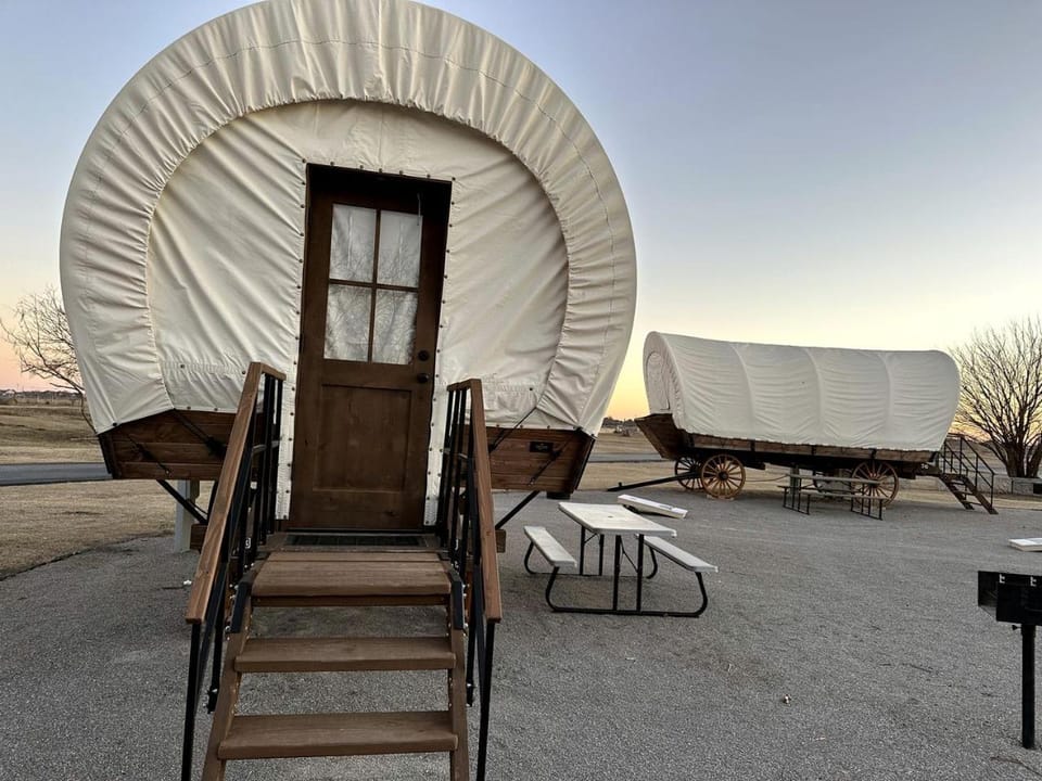 Rustic Conestoga Glamping Covered Wagon for Amazing Getaways to Oklahoma Farm House in Norman