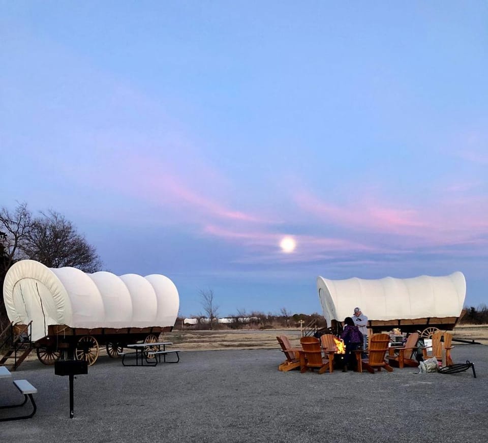 Perfect Glamping Vacations in this Rustic Conestoga Covered Wagon Rental in Oklahoma House in Norman