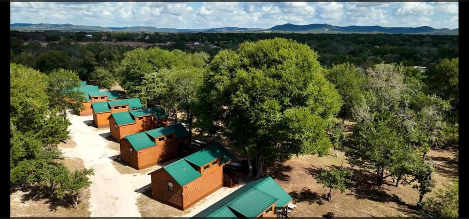Texas State Glamping Getaways to Nature in this Cute Log Cabin near Austin Cabin in Lakehills