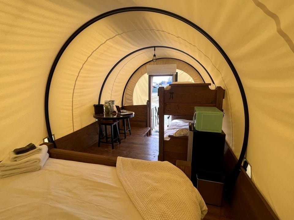 Go Glamping in North Carolina at this Wonderful Riverside Covered Wagon in Lillington House in North Carolina