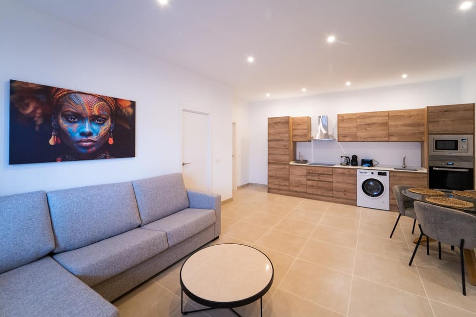 Kitchen or kitchenette, Living room, Dining area, oven, stove, toaster, washing machine