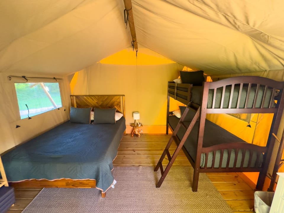 Settle Into a Cozy Lakeside Glamping Escape Luxury tent in Lake Livingston