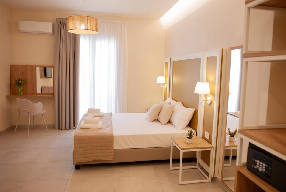 Bed, Photo of the whole room, Seating area, Bedroom, towels, wardrobe, air conditioner