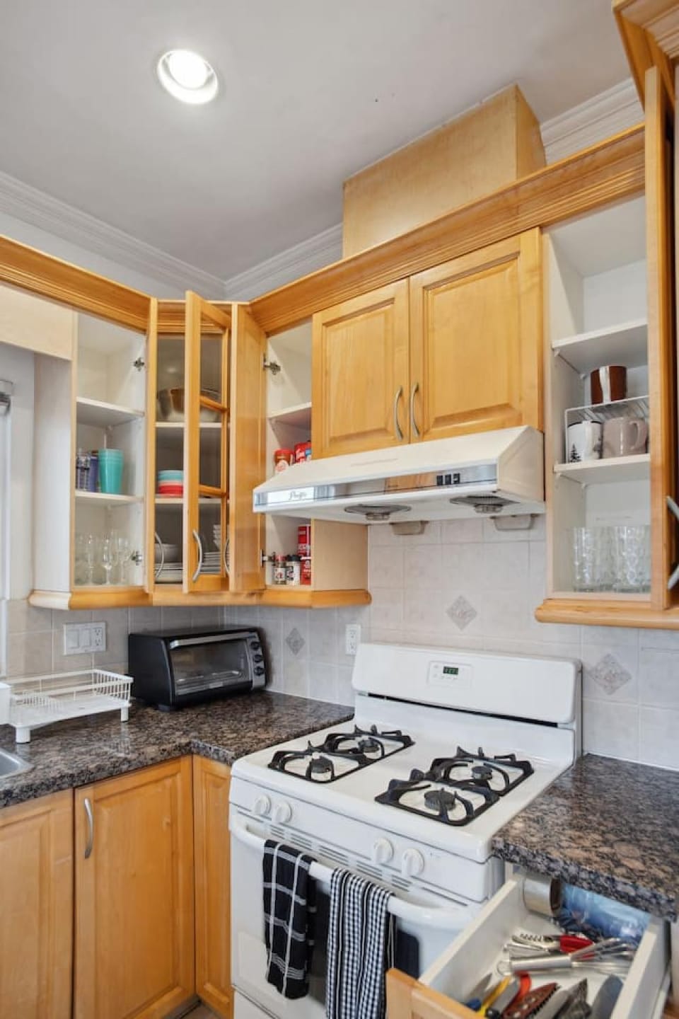 Kitchen or kitchenette, oven, stove, toaster