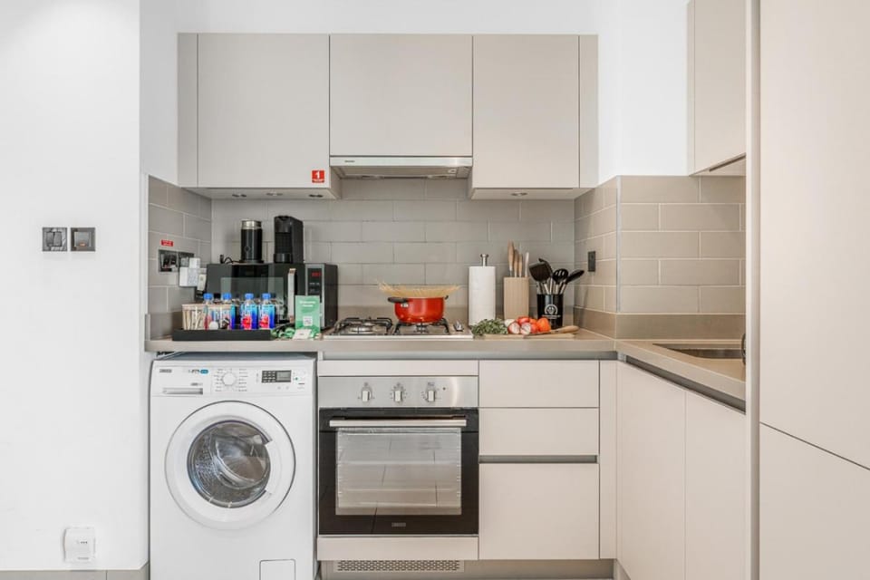 Kitchen or kitchenette, washing machine