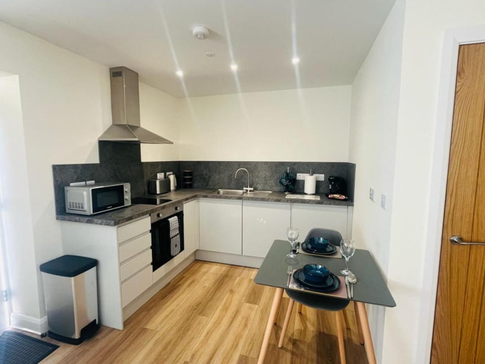 Kitchen or kitchenette, oven, stove, toaster