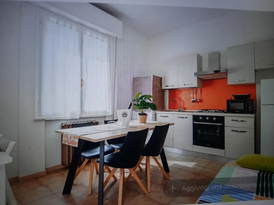 Kitchen or kitchenette, microwave, oven, toaster, washing machine