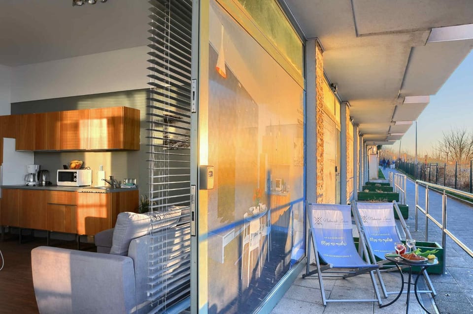 Property building, Day, View (from property/room), Balcony/Terrace, Kitchen or kitchenette, Living room, Seating area