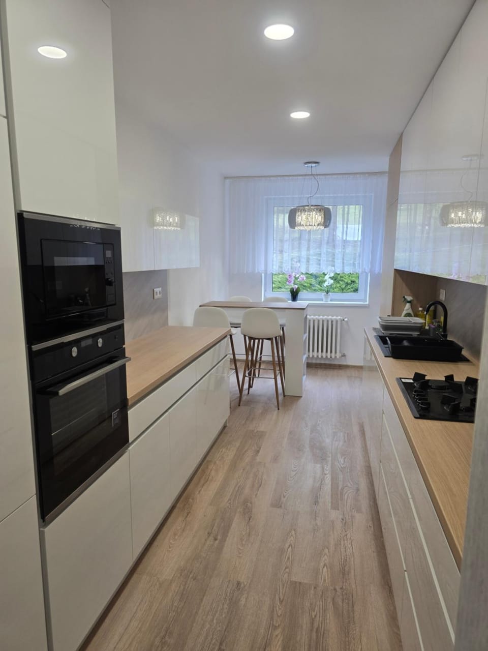Kitchen or kitchenette, oven, stove