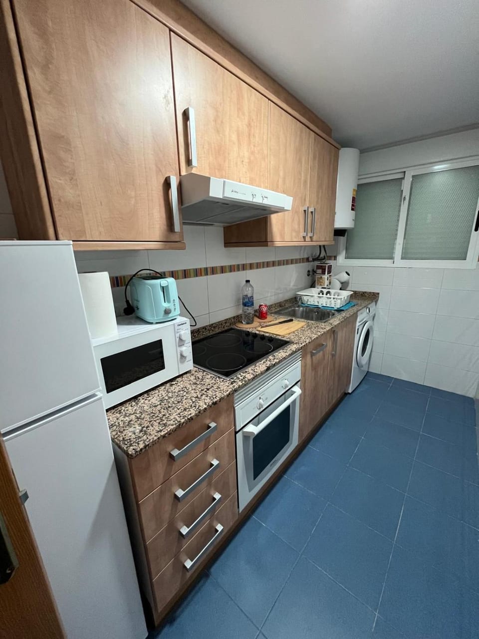 Kitchen or kitchenette, oven, stove, toaster