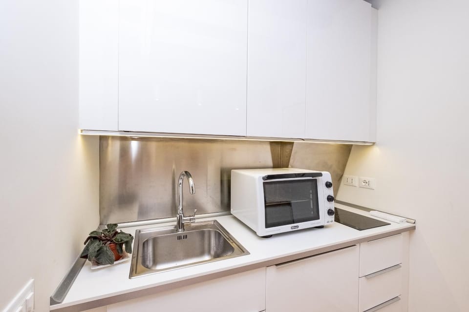 Coffee/tea facilities, Kitchen or kitchenette, minibar, stove, toaster