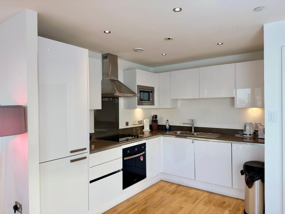 Kitchen or kitchenette, dishwasher, oven, stove, toaster