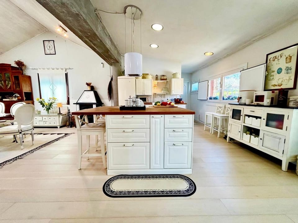 Kitchen or kitchenette, dishwasher, oven, stove, toaster