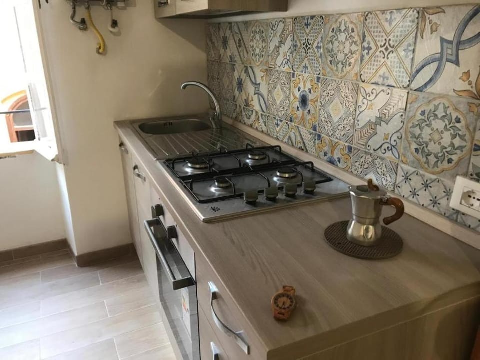 Kitchen or kitchenette, stove