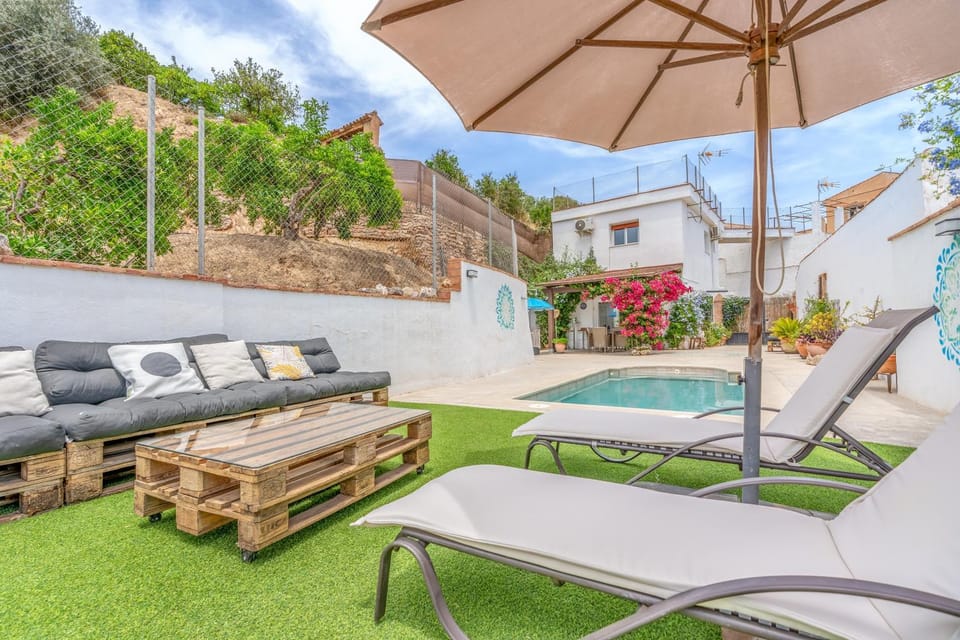 Property building, Living room, Swimming pool