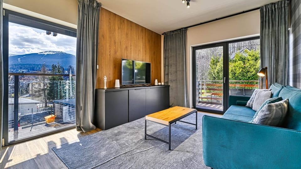 TV and multimedia, View (from property/room), Living room, Seating area, Mountain view
