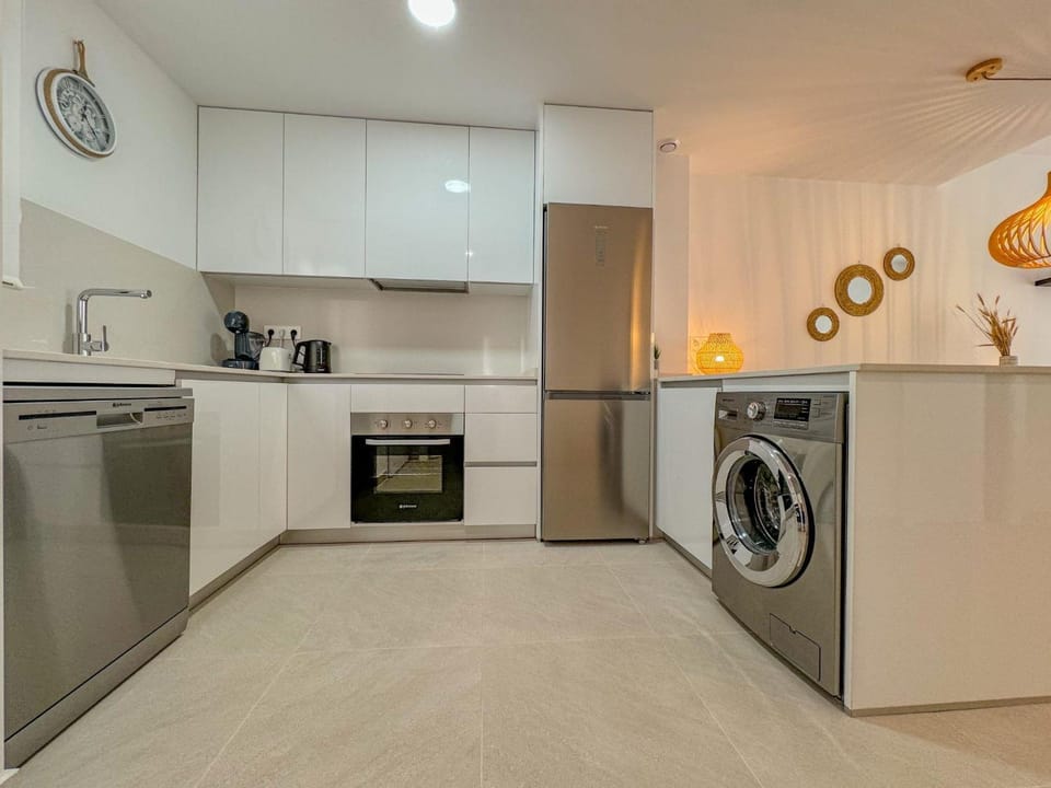 Kitchen or kitchenette, washing machine