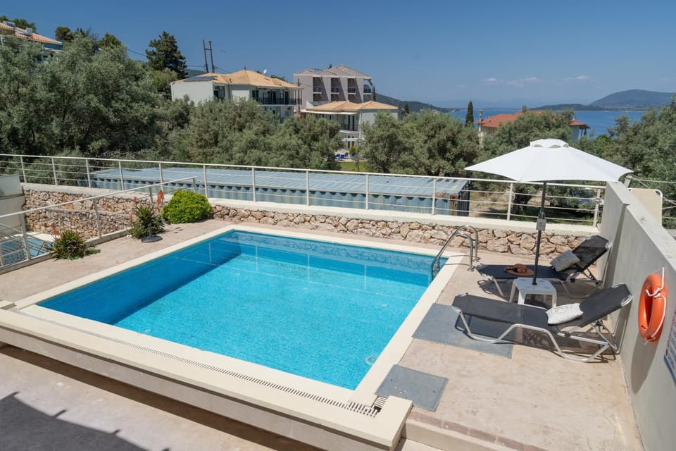 Property building, Living room, Swimming pool